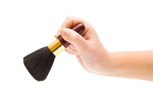 Hand holding brush — Stock Photo, Image