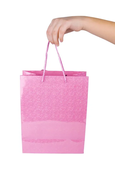 Růžová nákupní tašku v ruce — Stock fotografie