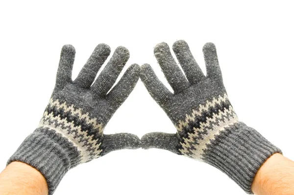 Pair woolen gloves on hands — Stock Photo, Image