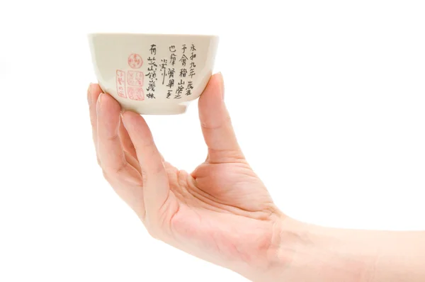 Hand with tea cup — Stock Photo, Image