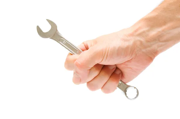 Wrench in hand on white background — Stock Photo, Image