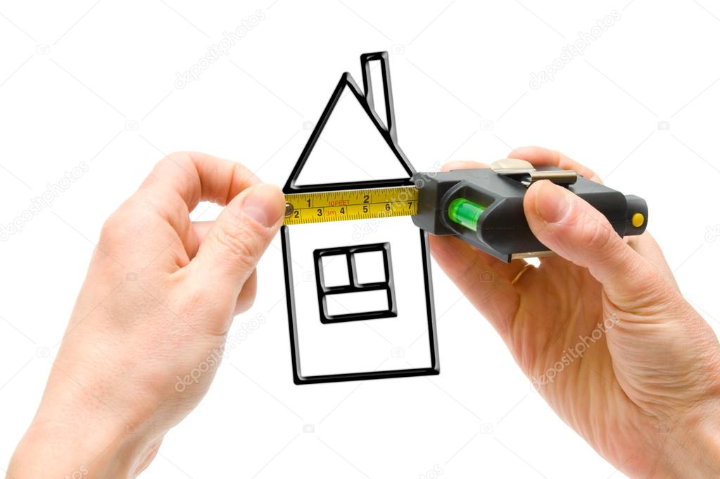 Tape-line in hands and picture of house