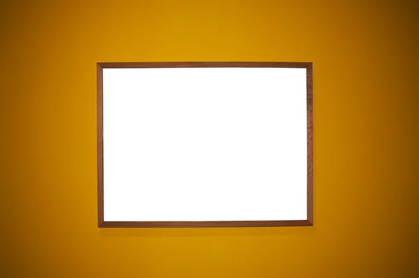 Рамка на коричневой стене — стоковое фото