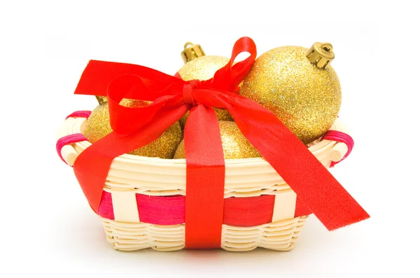 Christmas card.Yellow spheres in the basket Stock Photo