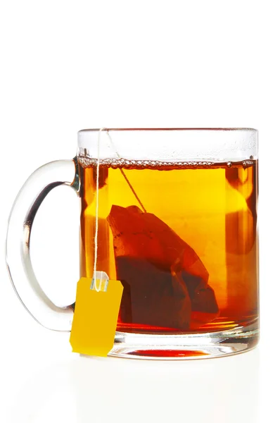 Glasbecher mit Teebeutel — Stockfoto