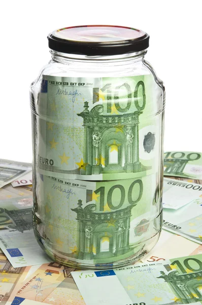 Glass jar and euro banknotes — Stock Photo, Image