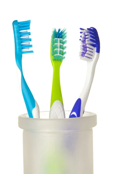 Zahnbürsten auf weißem Hintergrund — Stockfoto