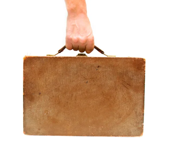 Hand som håller gamla trä resväska — Stockfoto