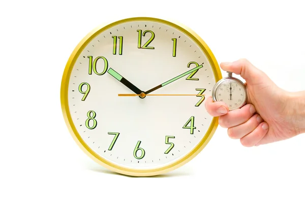 Classic clock and stopwatch in hand on white — Stockfoto