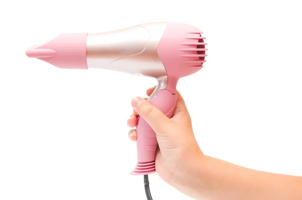 Kompaktowy różowy suszarka do włosów w ręku — Zdjęcie stockowe