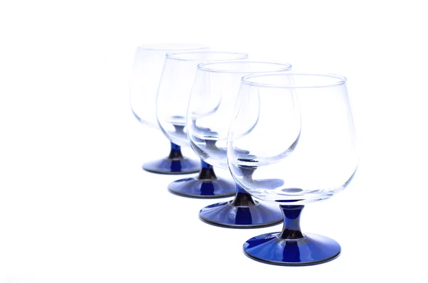 Quatre verres isolés sur fond de whie — Photo