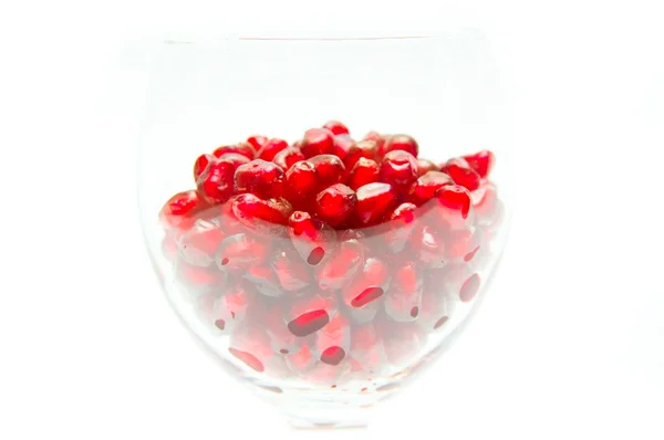 Seeds of pomegranate in glass closeup — Stock Photo, Image
