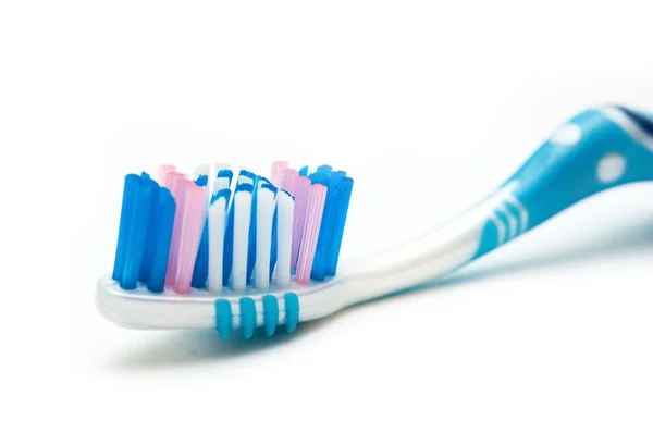 Синяя зубная щетка крупным планом — стоковое фото