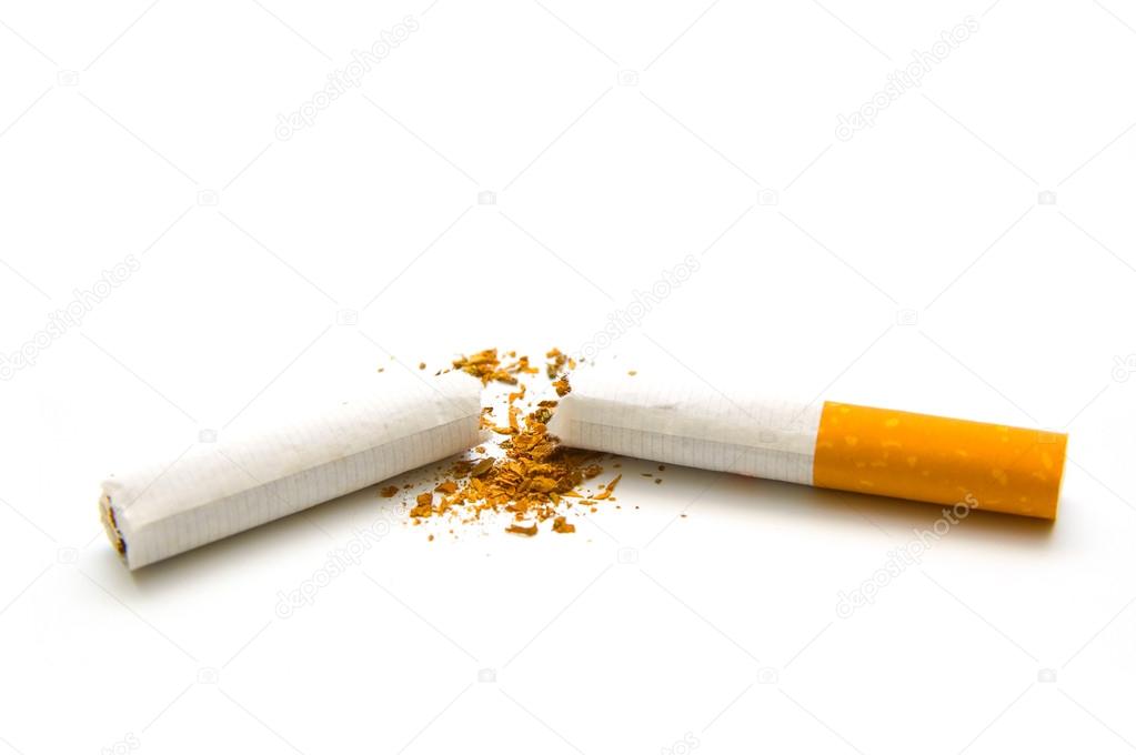 Broken cigarette on white