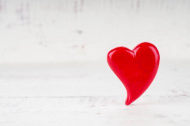 Heart close up on  wooden background. Valentines day card