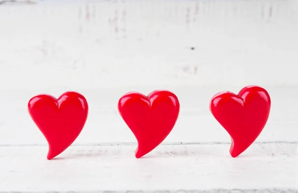 Three Red Hearts Close Wooden Background Valentines Day Card — Fotografia de Stock