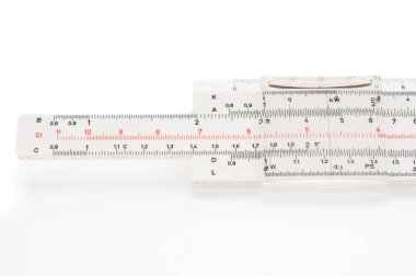 Retro slide ruler close up on white background