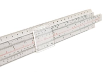 Vintage slide ruler close up isolated on white background