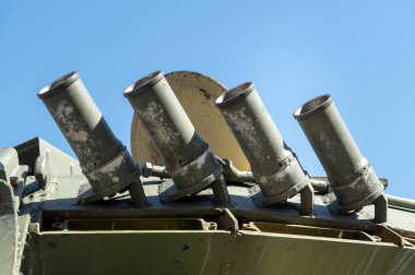 Elements for launching flares or protection on a military tank.