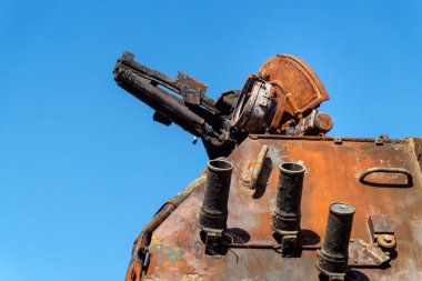 Protection elements on old military equipment burned down during the battle in the war in Ukraine. Weapon against the sky