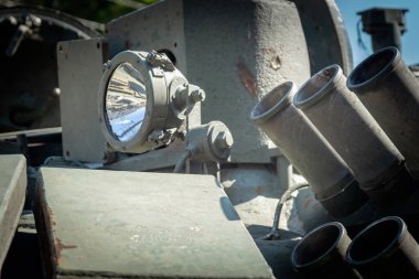 Protection elements of a military tank and a lantern for lighting