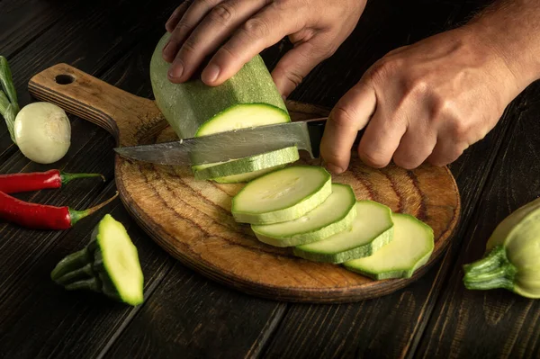Cook Cuts Vegetable Marrow Small Pieces Knife Fire Cooking Delicious — Stock Photo, Image