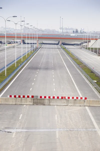 Highway under construction. Road partly ready. — Stock Photo, Image