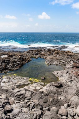 Natural pools Charcones with green algae in Lanzarote, Canary Islands, Spain