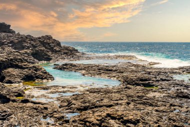 Natural pools Charcones with green algae in Lanzarote, Canary Islands, Spain