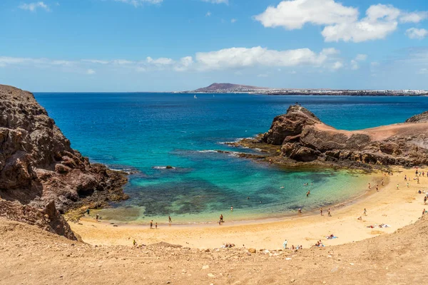 White sand and volcanic rocks at Papagayo Beach located on south end of Lanzarote, Canary Islands, Spain