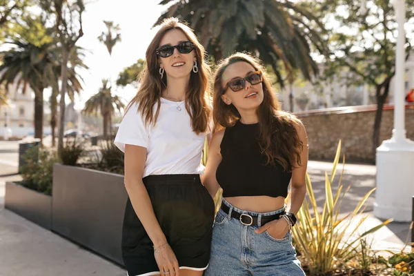 Attractive Young Pretty Women Sunglasses Wearing White Black Tops Posing — Stok Foto