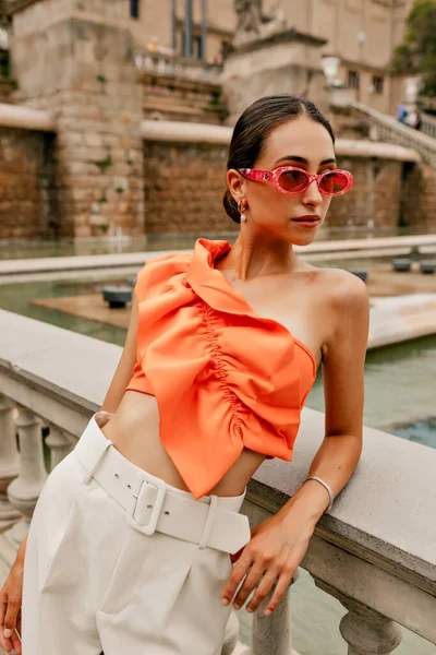 Slim Stylish Attractive Woman Tanned Skin Wearing Orange Blouse Beige — Stok Foto