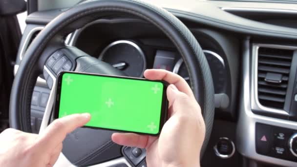 POV Man playing game on his phone. Close up shot of man using smartphone with chroma key. Green screen display. — Stock Video