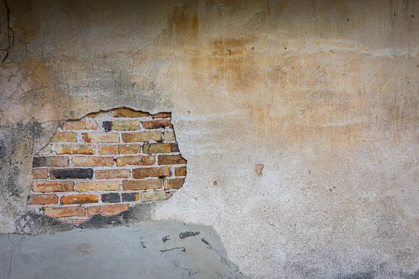 Quebra na parede de cimento — Fotografia de Stock