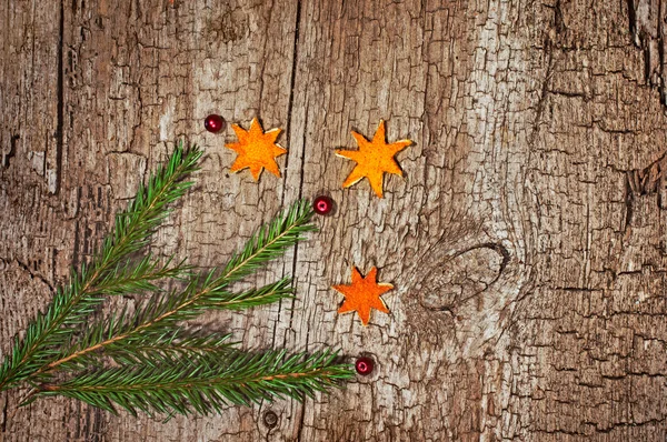 Christmas fir tree on wooden board — Stock Photo, Image