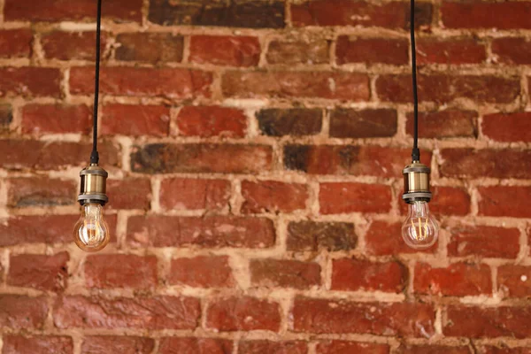 Decoratieve Antiek Edison Stijl Lampen Tegen Bakstenen Muur Achtergrond — Stockfoto