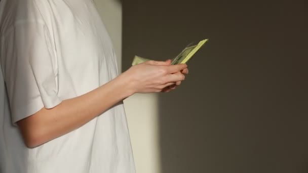 Successful woman checking amount of cash money. Close Up businesswoman hands holding one hundred dollar bills. Unrecognizable lady enjoying dollar banknotes in hands. Money payment concept — Stockvideo