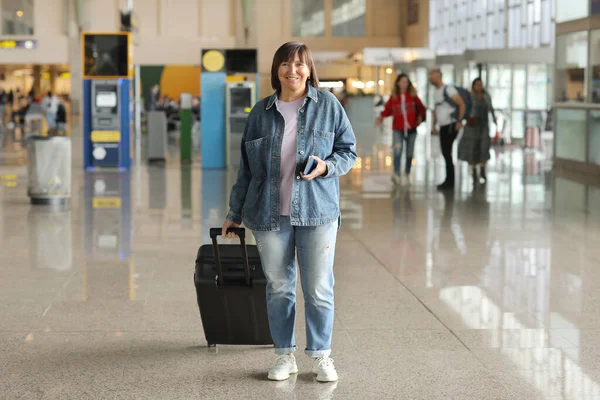 Smiling Middle Aged Woman Suitcase Passport Standing Arrival Departure Hall — Stock Photo, Image