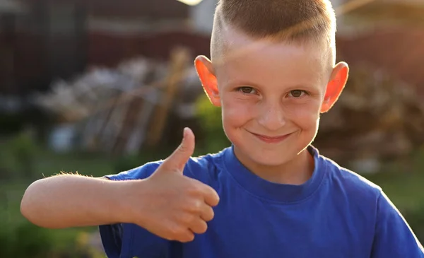 Positive Teen Young Man Smiling Camera Showing Thumb Sign Outdoors — Stock Photo, Image