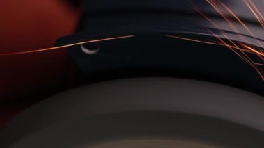 Değirmen taşından çıkan parlak turuncu ve kırmızı kıvılcımlar farklı yönlere uçar..