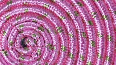 Pembe saykodelik çember döner, üst görünüm, yakın çekim.