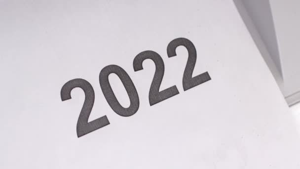 2022 Ändert Sich 2023 Auf Einem Blatt Papier Aus Dem — Stockvideo