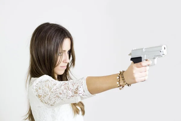 Girl with gun — Stock Photo, Image