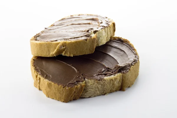 Pane con crema di cioccolato isolata — Foto Stock