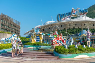 Hong Kong, China - July 24, 2022 : Tourist at the main entrance of Ocean Park Hong Kong. Ocean Park is an animal theme park and is one of the famous theme parks in Hong Kong.