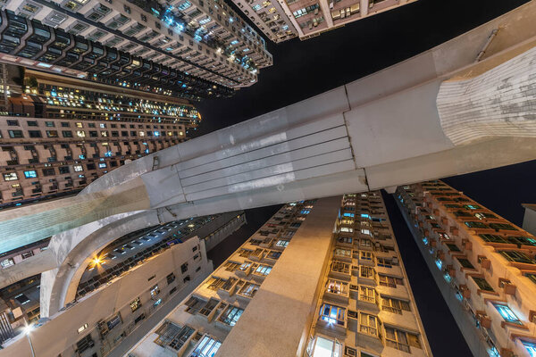 Elevated road through residential building in Hong Kong city