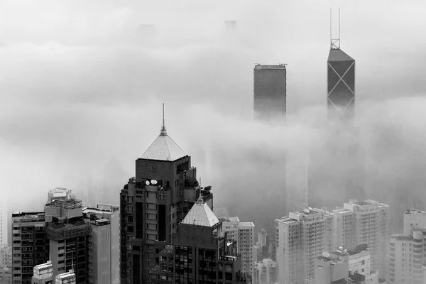 Skyscraper in downtown of Hong Kong city in fog