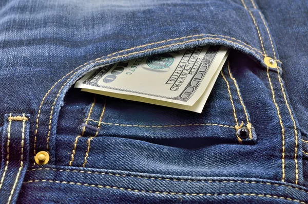 Hundra dollar bill i jeans — Stockfoto