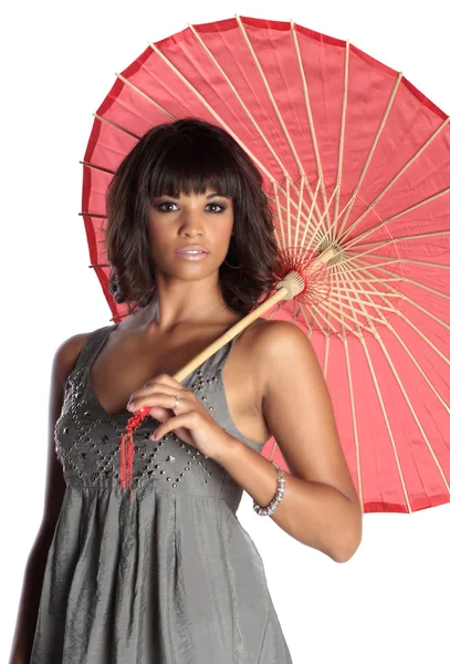 Elegancka brunetka gospodarstwa parasol — Zdjęcie stockowe