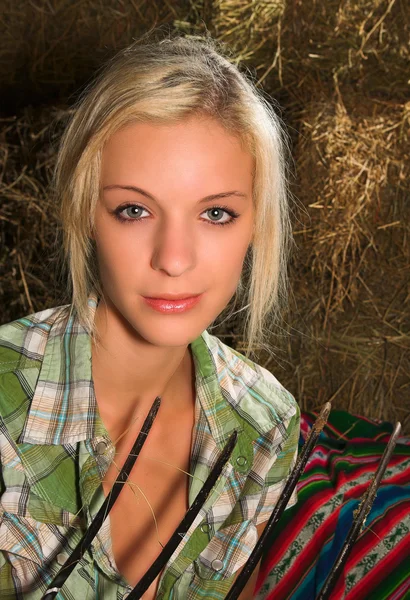 Blonde lady holding hay fork — Stock Photo, Image